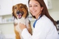 Vet clinic portrait, dog and happy woman for medical help, wellness healing services or animal healthcare support