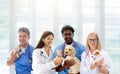 Vet with dog and cat. Puppy and kitten at doctor Royalty Free Stock Photo