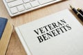 Veteran Benefits on a desk. Royalty Free Stock Photo