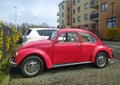 Veteran classic vintage old red popular folks red car Volkswagen Beetle one parked in Gdansk, Poland Royalty Free Stock Photo