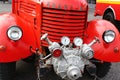 Veteran Czechoslovak firefighter Truck Praga RND, red colour, with AS-16 firefighter water sprinkler installed on front mask.