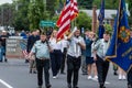 Veteran elderly old Uniformed soldiers in USA army all white men walk in formation