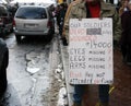 Veteran soldier protesting with sign