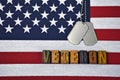 Veteran tribute with dog tags on flag Royalty Free Stock Photo