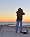 Veteran Trumpeter plays a tune at sunset in honor of the fallen