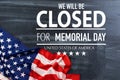 Veterans Day closed message with red, white and blue stars on burlap on a weathered whitewash wood. Royalty Free Stock Photo