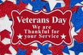 Veterans Day message with red, white and blue glitter stars