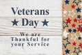 Veterans Day message with stars on a weathered whitewash wood Royalty Free Stock Photo