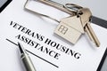 Veterans housing assistance documents and key from home Royalty Free Stock Photo