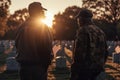 Veterans stands near graves of American heroes, sunlight,