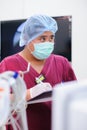 Veterinarian assistant in operation room. Royalty Free Stock Photo