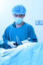 Veterinarian doctor in operation room for laparoscopic surgical (art lighting shot) Royalty Free Stock Photo
