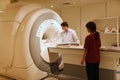 Veterinarian doctor working in MRI scanner room