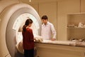 Veterinarian doctor working in MRI scanner room