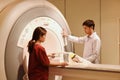 Veterinarian doctor working in MRI scanner room