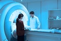 Veterinarian doctor working in MRI scanner room Royalty Free Stock Photo
