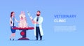 Veterinarian Doctors Examining Dog Vet Clinic And Veterinary Medicine Concept