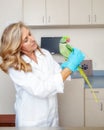 Veterinarian Examining Parrot Bird