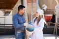 Veterinarian and farmer in pigsty Royalty Free Stock Photo