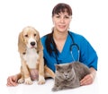 Veterinarian hugging cat and dog. isolated on white background