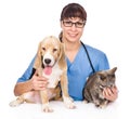 Veterinarian hugging cat and dog. on white background Royalty Free Stock Photo