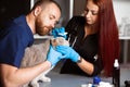Veterinarian and nurse treat wounded cat Royalty Free Stock Photo