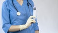 Veterinarian with syringe in hand, euthanasia of animals, vaccination, antivirus