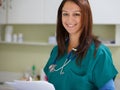Veterinary portrait, clinic documents and happy woman with test results, assessment notes or animal healthcare nursing