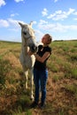 Veterinary woman controling horse health