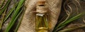 vetiver essential oil on a burlap background top view