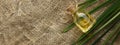 vetiver essential oil on a burlap background top view