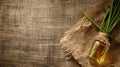 vetiver essential oil on a burlap background top view