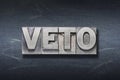 veto Latin den