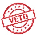 VETO text written on red vintage stamp