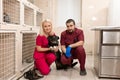 Vets examine shy dog in animal hospital Royalty Free Stock Photo