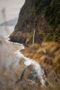 Veu da Noiva Viewpoint of Waterfall falling into the Ocean, Madeira, Portugal