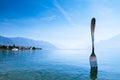 Vevey, Switzerland - Lake Geneva shore with The Fork of Vevey modern installation art with Swiss alps view