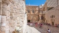 Vew on main entrance in at the Church of the Holy Sepulchre in Old City of Jerusalem timelapse hyperlapse Royalty Free Stock Photo