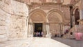 Vew on main entrance in at the Church of the Holy Sepulchre in Old City of Jerusalem timelapse hyperlapse Royalty Free Stock Photo