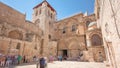 Vew on main entrance in at the Church of the Holy Sepulchre in Old City of Jerusalem timelapse hyperlapse Royalty Free Stock Photo