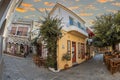 Vew of the narrow streets, traditional taverns, Greek Mediterranean architecture, Skiathos old town, Greece Royalty Free Stock Photo