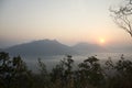 Vew of phu tok mountain with mist and sun at viewpoint in morning Royalty Free Stock Photo