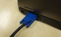 VGA cable connected to laptop Royalty Free Stock Photo