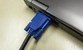 VGA cable connected to laptop Royalty Free Stock Photo