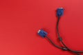 VGA monitor cable on red background Royalty Free Stock Photo