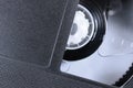 VHS Tape Macro Closeup, large detailed black retro videotape cassette background, epmty blank vintage copy space Royalty Free Stock Photo