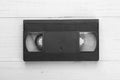 VHS tape from the 80s and 90s on white wood background