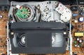 VHS video cassette recorder inside with videocassette. Tape play video file or movie. Top view Royalty Free Stock Photo