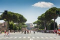 The Via dei Fori Imperial road, pictured here looking towards the Colosseum, which cuts through the city center and is surrounded