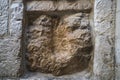 Via Dolorosa, Jerusalem, Israel. An old square stone with a cavity which is said to be the imprint of Jesus hand. Jerusalem Royalty Free Stock Photo